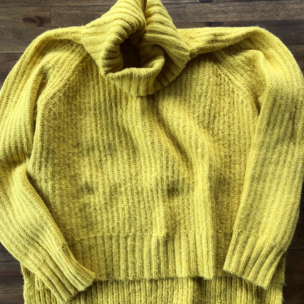 Fuzzy yellow sweater.